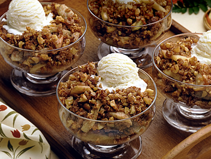FOUR DISHES OF DESSERT ON A TRAY