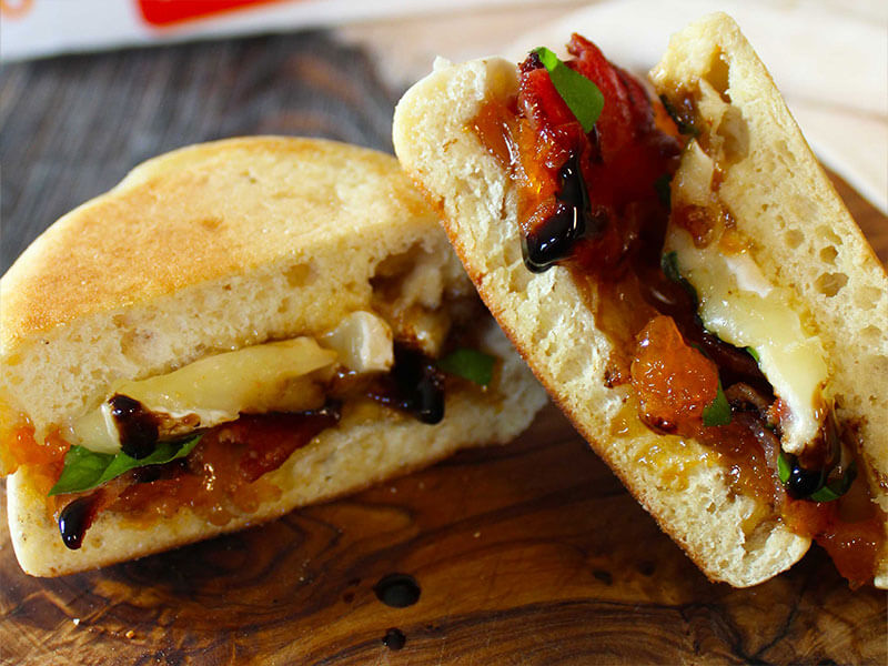 bays sandwich with cheese fruit and a glaze