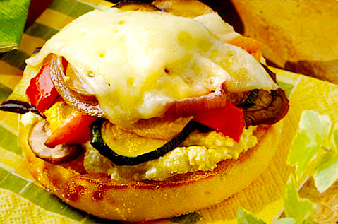 BAYS TOPPED WITH EGG VEGGIES AND MELTY CHEESE