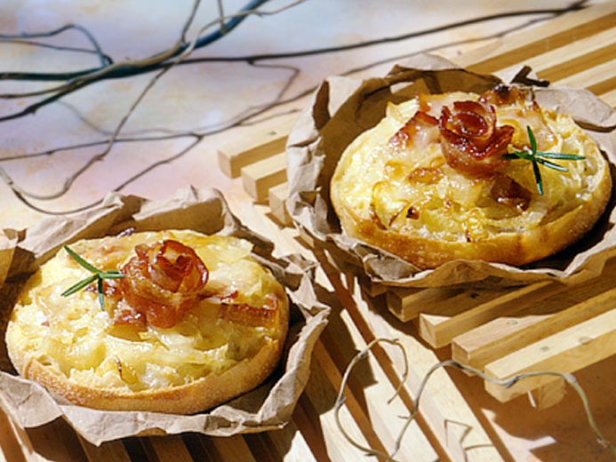 EGG AND BACON BAKED ON BAYS ON ARTISAN PAPER